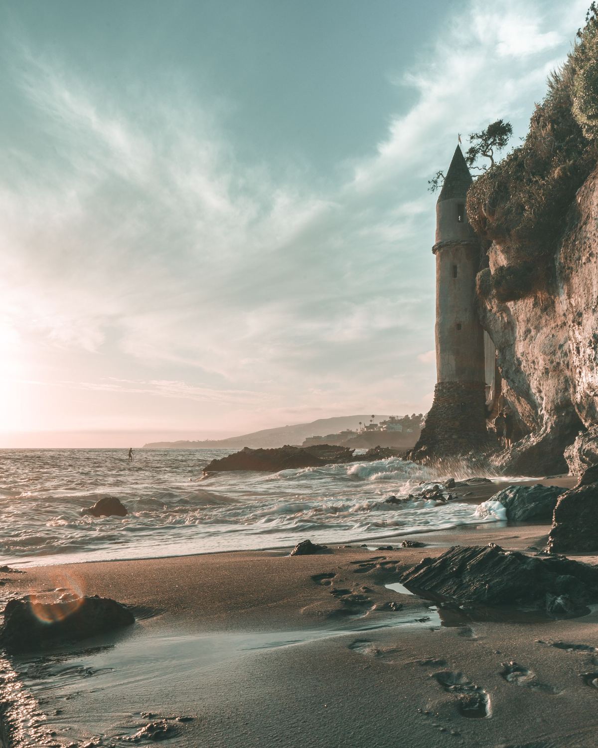 Victoria Beach in Laguna Beach with its stone tower at sunset